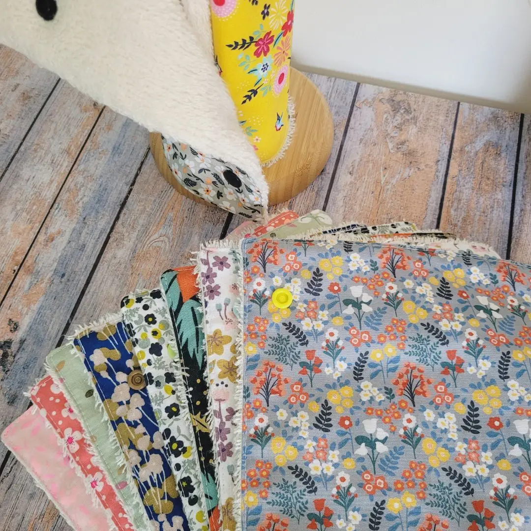Essuie tout avec pressions multicolore